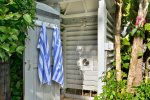 Outdoor shower at rear of Family Pool in the midst of orchids and gardensd